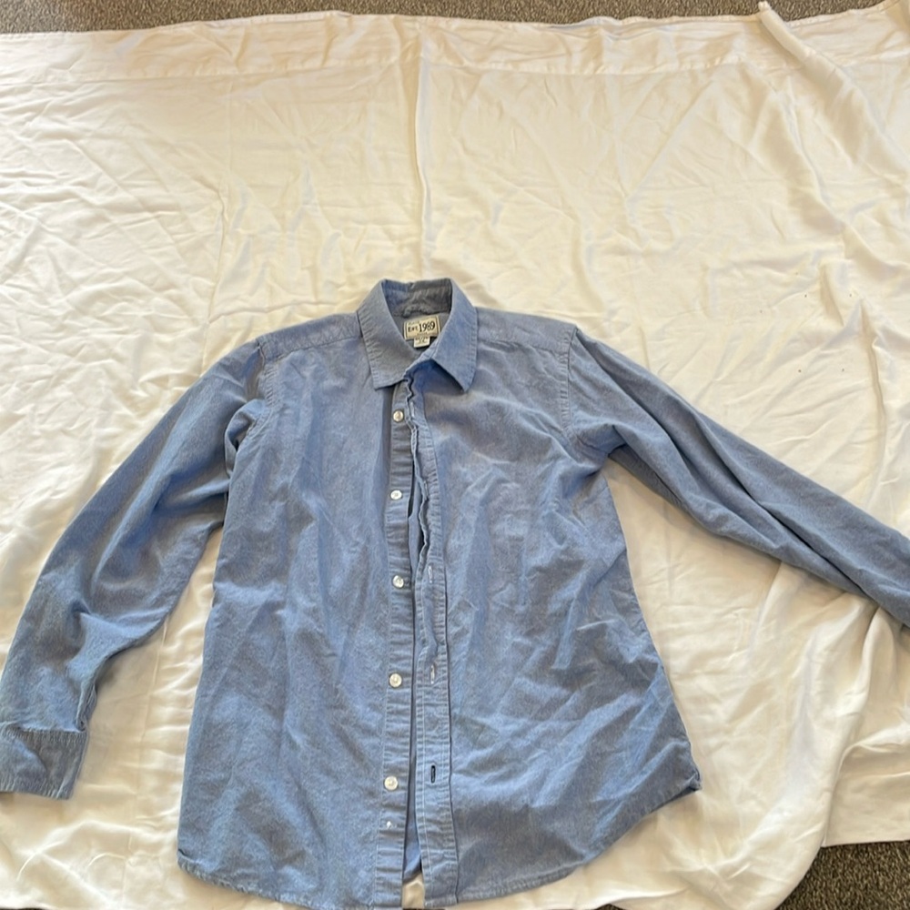 Place long sleeve dress shirt.